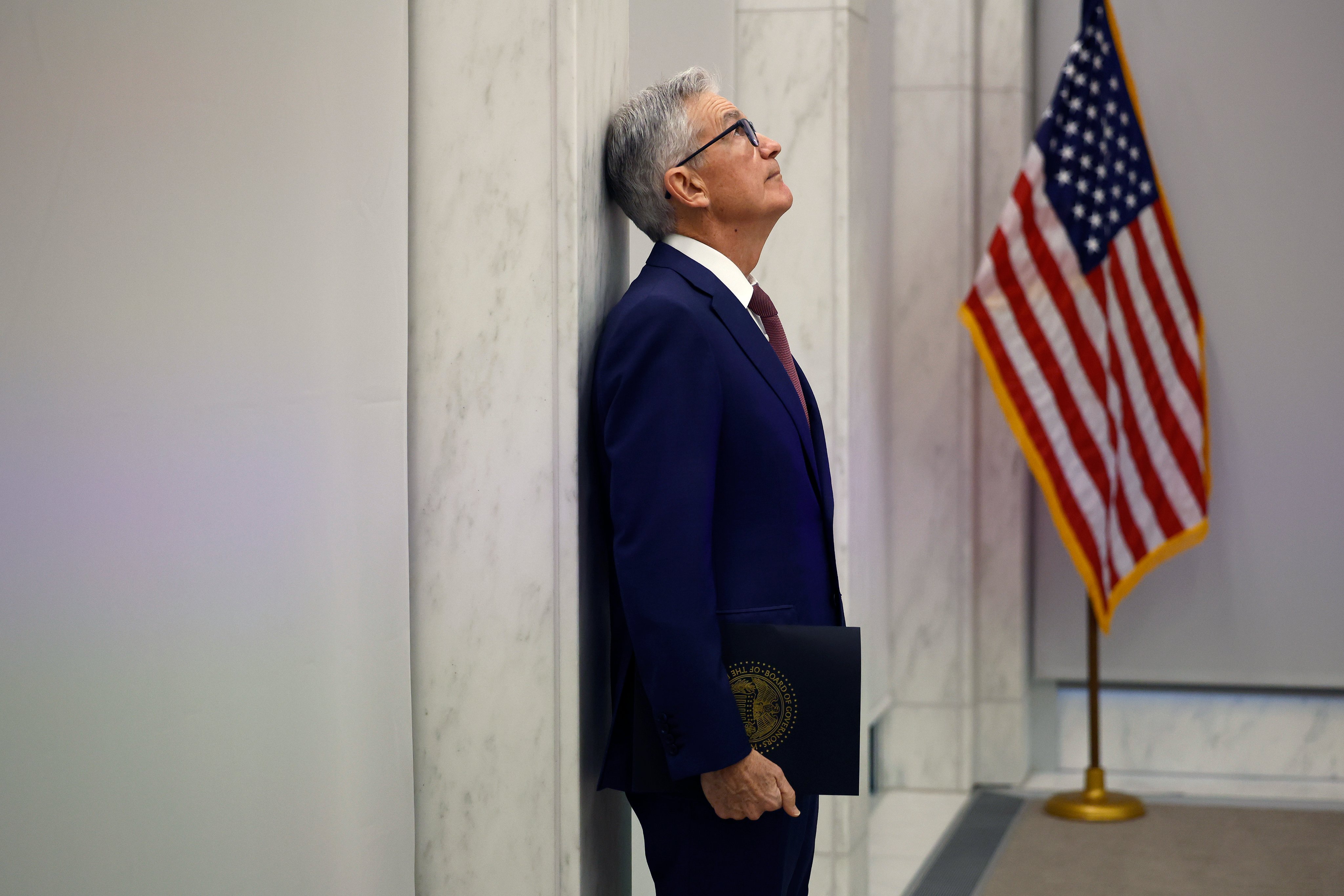 Federal Reserve Chair Jerome Powell Pausing Against the Wall meme template