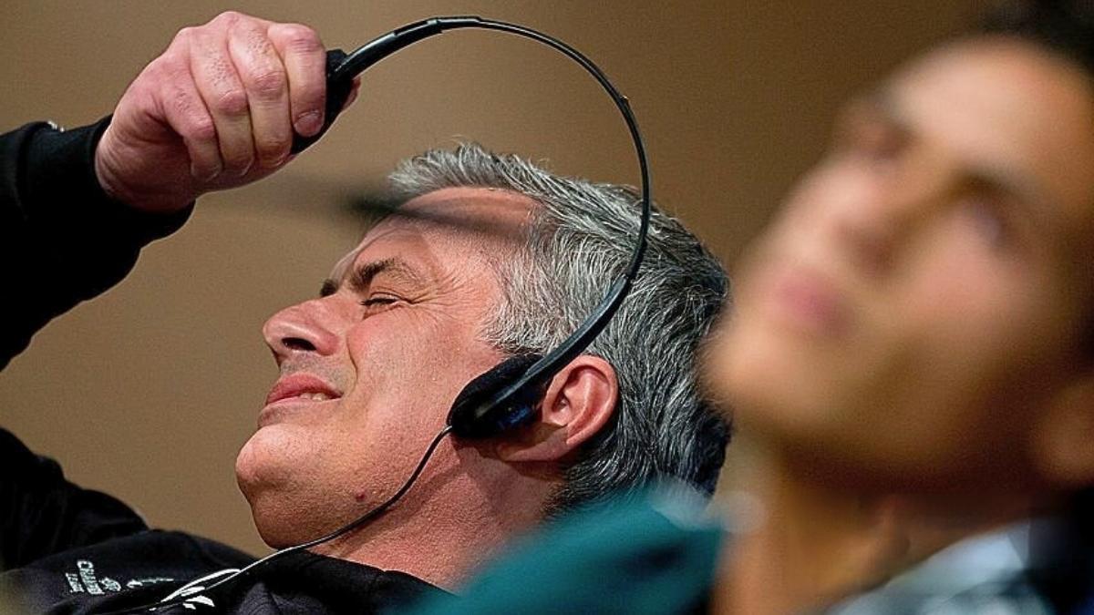 Guy Pulling Off His Headset in Disgust