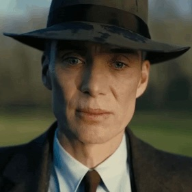 Oppenheimer in top hat meme template variation